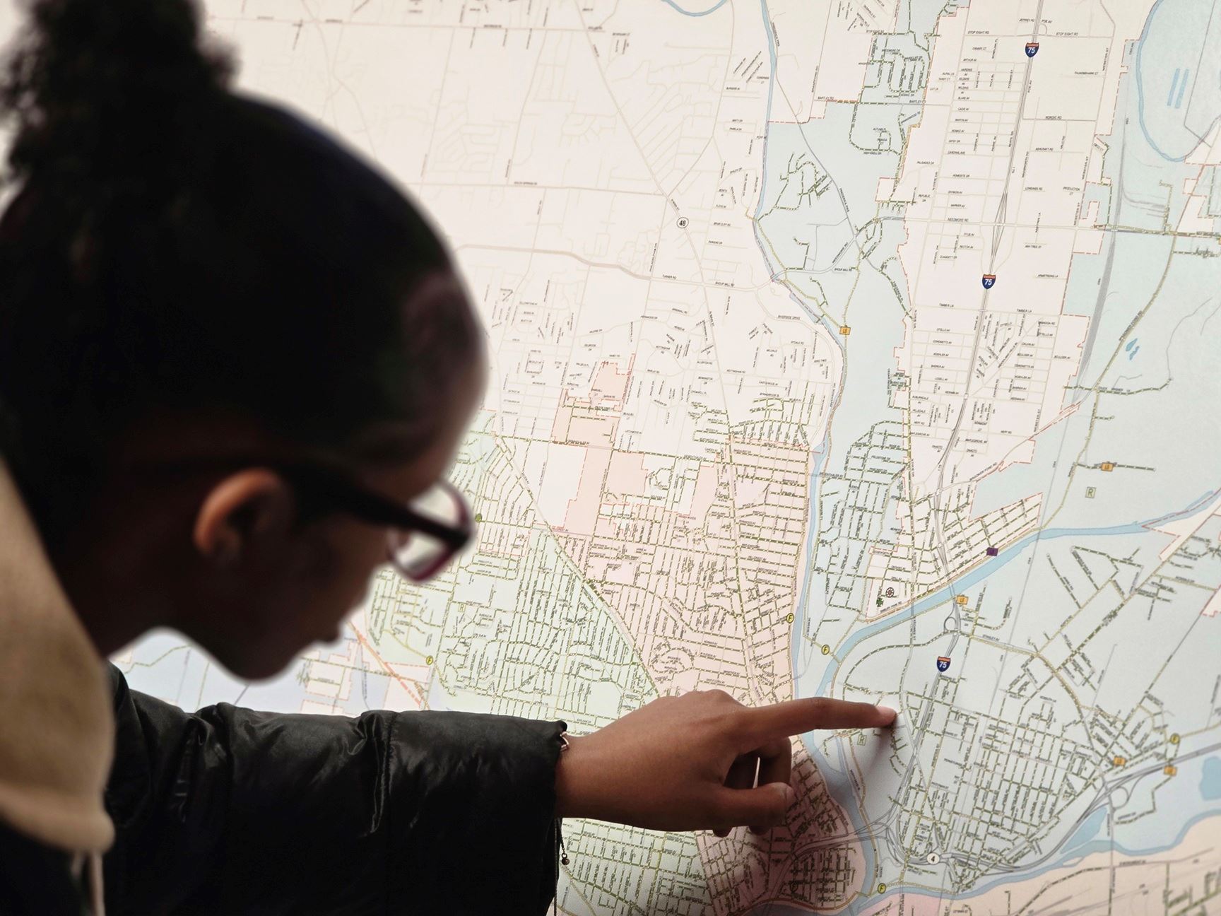 Resident looking at map of Source Water Protection Area