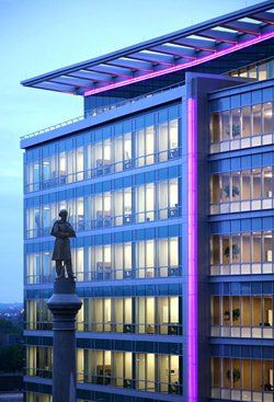 Statue in front of building